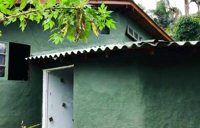 Imagem: A casa possui 3 Dormitórios, 1 Banheiro, 1 Vaga na garagem