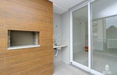 Imagem: O apartamento possui 3 Dormitórios, 2 Banheiros, 2 Vagas na