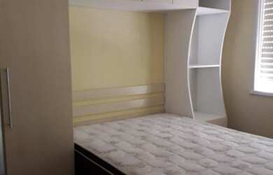 Imagem: O apartamento possui 2 Dormitórios, 1 Banheiro, 1 Vaga na garagem