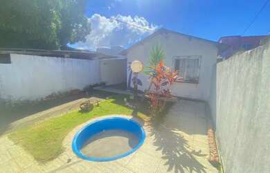 Imagem: A casa possui 2 Dormitórios, 1 Banheiro, 4 Vagas na garagem