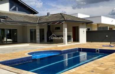 Imagem: A casa em condomínio possui 3 Dormitórios, 3 Banheiros, 4