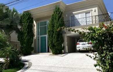 Imagem: A casa em condomínio possui 5 Dormitórios, 5 Banheiros, 4