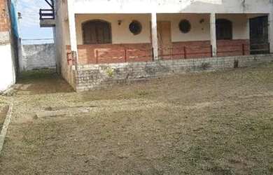 Imagem: A casa possui 4 Dormitórios, 3 Banheiros, 5 Vagas na garagem