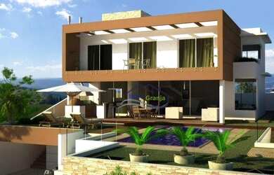 Imagem: A casa em condomínio possui 4 Dormitórios, 5 Banheiros, 5