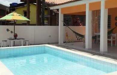 Imagem: A casa possui 4 Dormitórios, 3 Vagas na garagem e está localizado