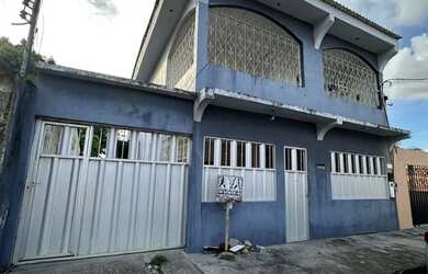 Imagem: A casa possui 5 Dormitórios, 2 Banheiros, 2 Vagas na garagem