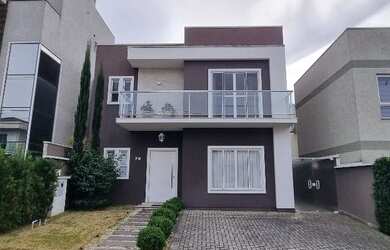 Imagem: A casa em condomínio possui 3 Dormitórios, 3 Banheiros, 138m²