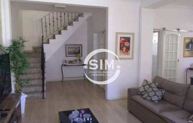 Imagem: A casa possui 5 Dormitórios, 4 Banheiros, 2 Vagas na garagem