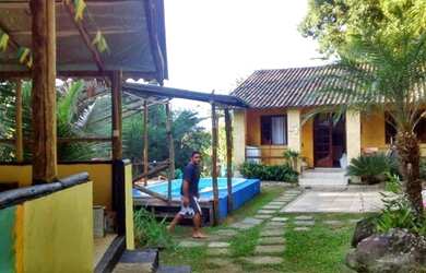 Imagem: A casa possui 3 Dormitórios, 3 Banheiros e está localizado