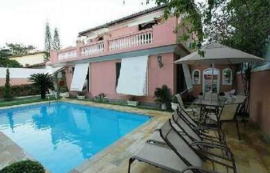 Imagem: A casa em condomínio possui 5 Dormitórios, 5 Banheiros, 5