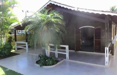 Imagem: A casa possui 3 Dormitórios, 3 Vagas na garagem e está localizado