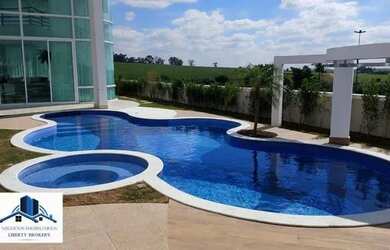 Imagem: A casa possui 5 Dormitórios, 5 Banheiros, 4 Vagas na garagem