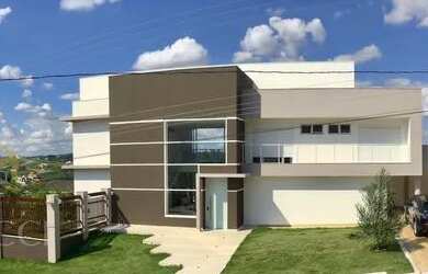 Imagem: A casa em condomínio possui 5 Dormitórios, 5 Banheiros, 5