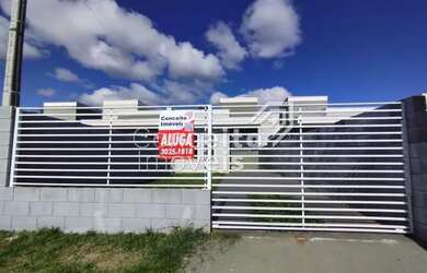 Imagem: A casa possui 2 Dormitórios, 1 Banheiro, 2 Vagas na garagem