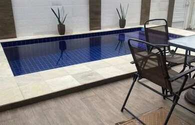 Imagem 7: Casa de condomínio para venda possui 220 metros quadrados com 4 quartos