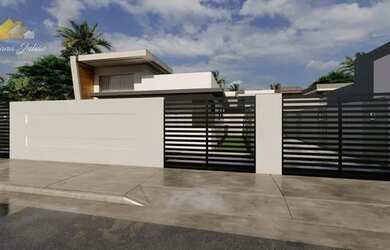 Imagem: A casa possui 3 Dormitórios, 2 Banheiros, 2 Vagas na garagem