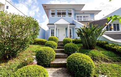 Imagem: A casa possui 5 Dormitórios, 5 Banheiros, 5 Vagas na garagem