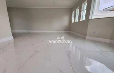 Imagem: A casa possui 3 Dormitórios, 5 Banheiros, 5 Vagas na garagem