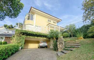 Imagem: A casa em condomínio possui 4 Dormitórios, 5 Banheiros, 4