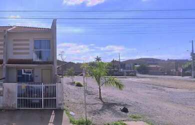 Imagem: A casa possui 2 Dormitórios, 2 Banheiros, 1 Vaga na garagem