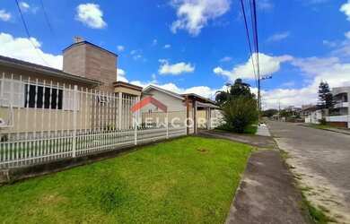 Imagem: A casa à venda possui 3 Dormitórios, 1 Banheiro, 1 Vaga na