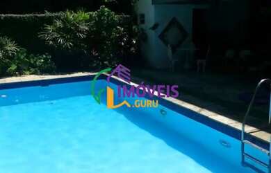 Imagem: A casa possui 4 Dormitórios, 5 Banheiros, 5 Vagas na garagem