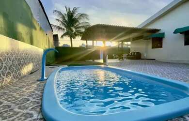 Imagem: A casa possui 4 Dormitórios, 2 Banheiros, 3 Vagas na garagem