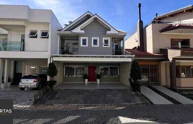 Imagem: A casa em condomínio possui 3 Dormitórios, 3 Banheiros, 3