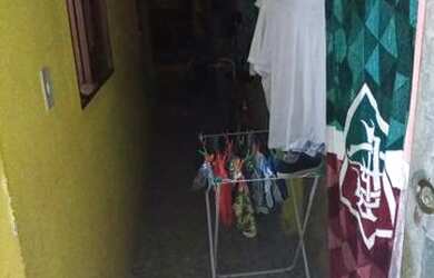 Imagem: A casa possui 2 Dormitórios e 1 Banheiro e está localizado