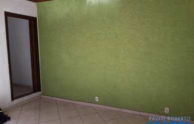 Imagem: A casa possui 3 Dormitórios, 1 Banheiro, 2 Vagas na garagem