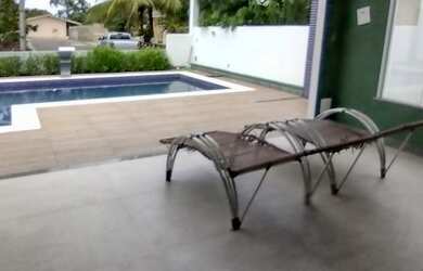 Imagem: A casa em condomínio possui 4 Dormitórios, 5 Banheiros, 2