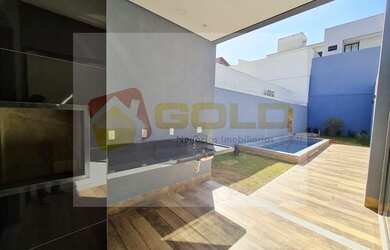 Imagem: A casa possui 3 Dormitórios, 4 Banheiros, 3 Vagas na garagem