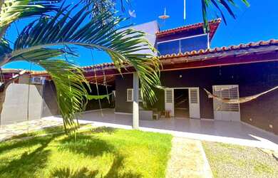 Imagem: A casa possui 4 Dormitórios, 4 Banheiros, 4 Vagas na garagem