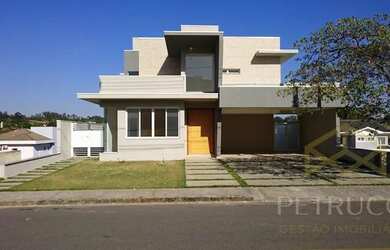 Imagem: A casa em condomínio possui 3 Dormitórios, 4 Banheiros, 2