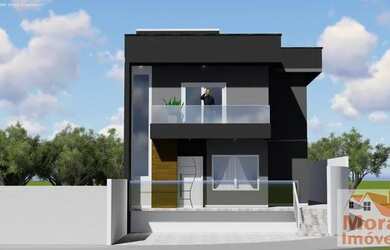 Imagem: A casa possui 3 Dormitórios, 3 Banheiros, 2 Vagas na garagem