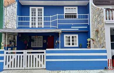 Imagem: A casa em condomínio possui 3 Dormitórios, 2 Banheiros, 2