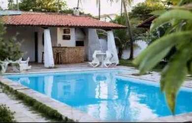 Imagem: A casa possui 5 Dormitórios, 4 Banheiros, 3 Vagas na garagem