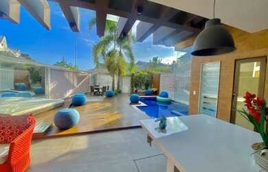 Imagem: A casa em condomínio possui 4 Dormitórios, 5 Banheiros, 3