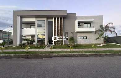 Imagem: A casa em condomínio possui 5 Dormitórios, 1 Banheiro, 2 Vagas