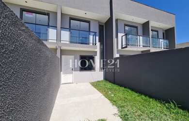 Imagem: A casa possui 3 Dormitórios, 2 Banheiros, 2 Vagas na garagem