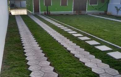 Imagem: A casa possui 2 Dormitórios, 3 Banheiros, 3 Vagas na garagem