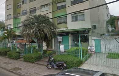 Imagem: O apartamento possui 1 Dormitório, 1 Banheiro, 1 Vaga na garagem