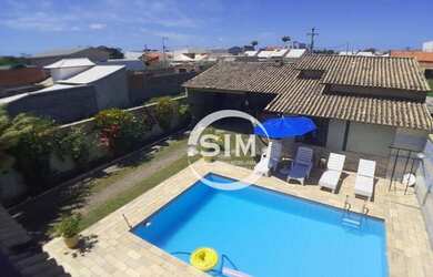 Imagem: A casa possui 3 Dormitórios, 2 Banheiros, 5 Vagas na garagem