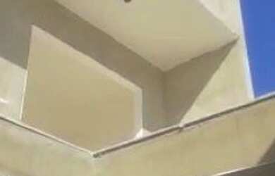 Imagem: A casa possui 3 Dormitórios, 4 Banheiros, 2 Vagas na garagem