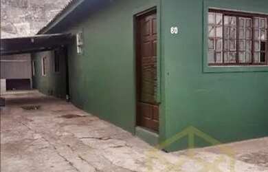 Imagem: A casa possui 2 Dormitórios, 1 Banheiro, 3 Vagas na garagem