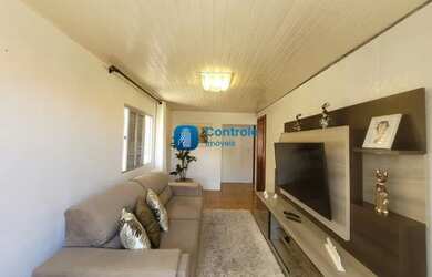 Imagem: A casa possui 3 Dormitórios, 1 Banheiro, 3 Vagas na garagem