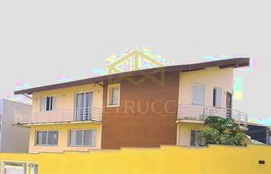 Imagem: A casa possui 3 Dormitórios, 5 Banheiros, 4 Vagas na garagem