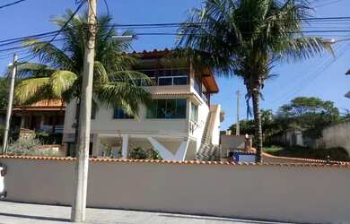 Imagem: A casa possui 2 Dormitórios, 1 Banheiro, 4 Vagas na garagem