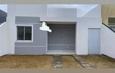 Imagem: A casa possui 2 Dormitórios, 1 Banheiro e 4 Vagas na garagem