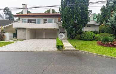 Imagem: A casa em condomínio possui 5 Dormitórios, 5 Banheiros, 4